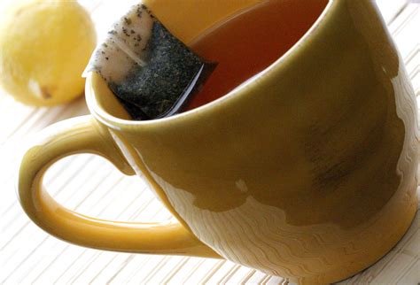 Free picture: yellow, ceramic, cup, contained, hot, water, resting, rim
