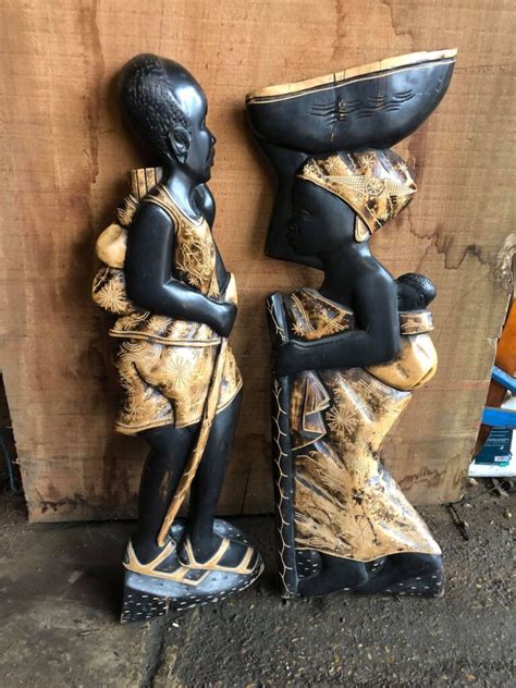 Pair Of Hardwood Decorative African Carvings A And D Reclaim