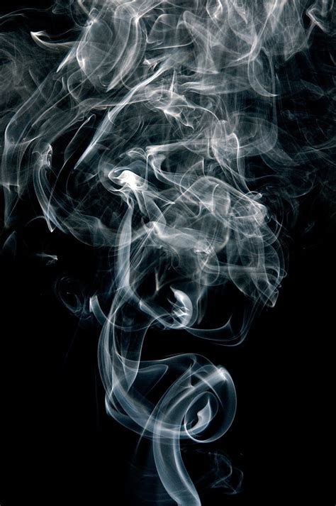 Royalty-Free photo: White smoke in black background | PickPik