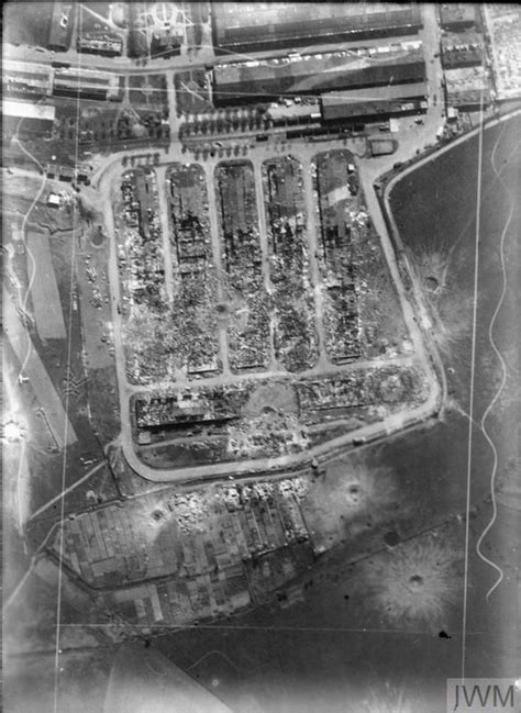 Part of a vertical photographic-reconnaissance aerial showing the ...