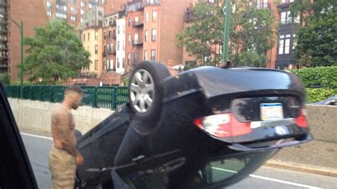 Oui Charge After Car Flips On Storrow Drive