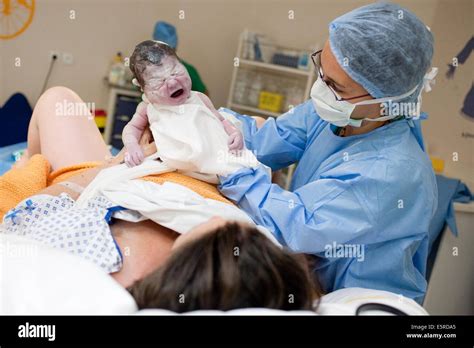 Woman in labor room during delivery, Obstetrics and gynaecology ...