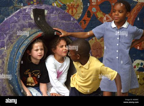 Primary School Children In Playground Stock Photo Alamy