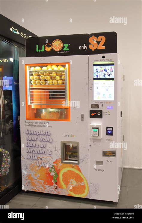 Fresh Orange Squeeze Juice Vending Machine In Singapore Stock Photo Alamy