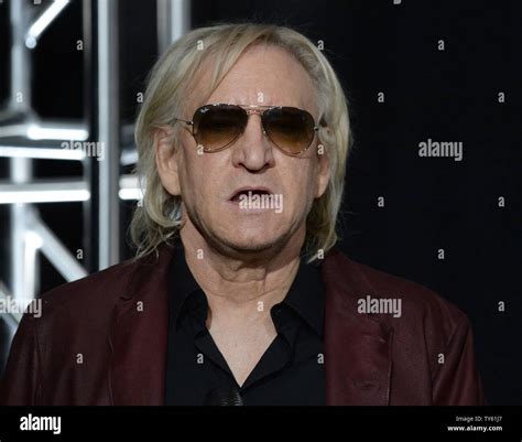 Musician Joe Walsh Introduces Country Singer Vince Gill During A Ceremony Inducting Him Into