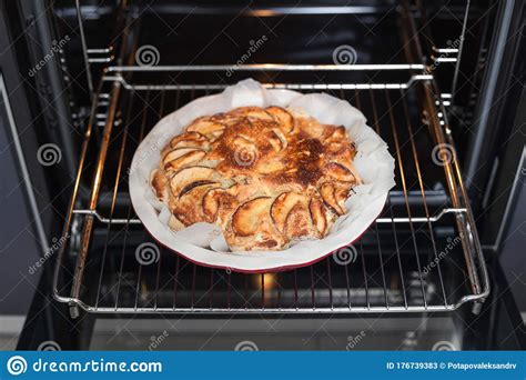 Freshly Baked Apple Pie At Home In The Oven In The Kitchen Apple