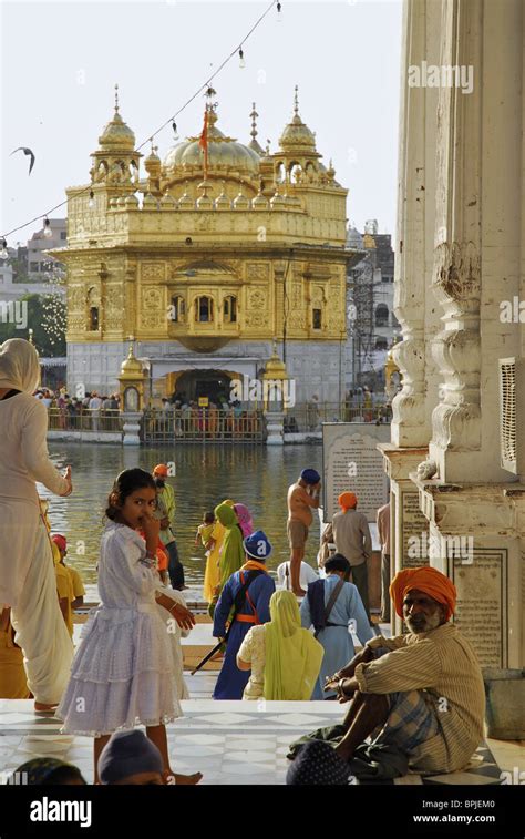 Pilgrims In Front Of The Golden Temple Sikh Holy Place Amritsar