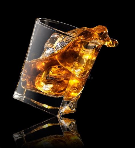 Splash Of Whiskey In Glass Stock Photo Image Of Bourbon