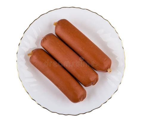 Three Boiled Sausages In Glass Plate Isolated On White Background Stock