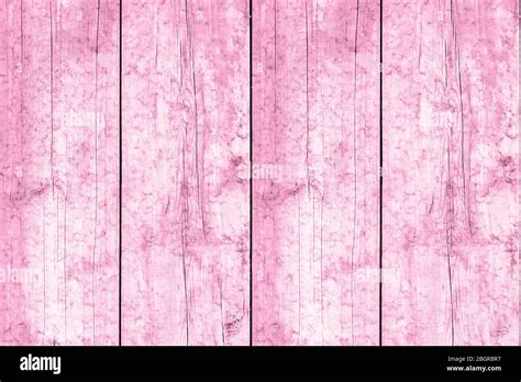 El suelo era de madera rosa pastel y estaba sucio Fondo de tablón rosa