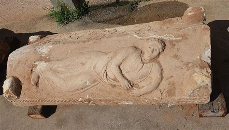 Rare Roman Era Coffin Features Carving Of Curly Haired Man Live Science