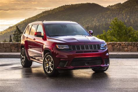 Side By Side Comparison Of The 2021 Jeep Grand Cherokee Srt And Trackhawk