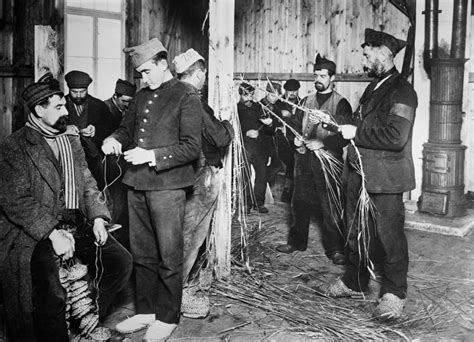 Wwi Prisoners 1915 Nallied Prisoners Making Shoes From Straw At A