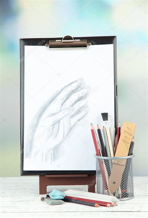 Sketch with professional art materials, on wooden table Stock Photo by ...