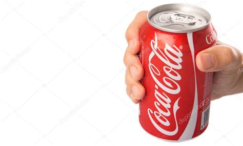 Holding A Can Of Coca Cola — Stock Editorial Photo © Akulamatiau 62298197