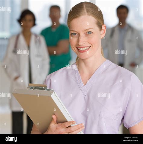 Female Doctor Holding Chart Stock Photo Alamy