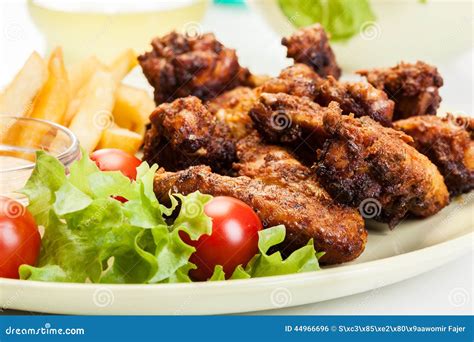 Chicken Wings With Fries French And Spicy Sauce Stock Photo Image Of