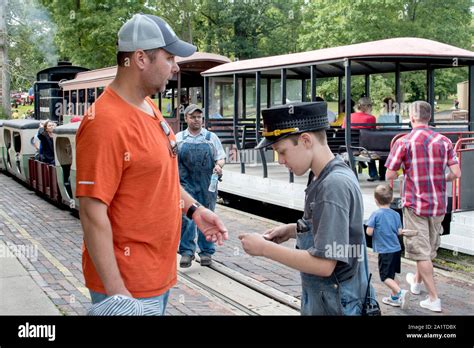 Old fashioned train conductor hi-res stock photography and images - Alamy