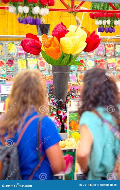 Pair of Girls Looks the Giant Tulips at Bloemenmarkt Amsterdam ...