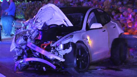 Tesla Destroyed After Dump Truck Rollover Crash On The Turnpike In