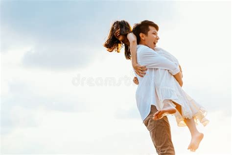 Romantic Couple Having Love and Hug on the Beach Stock Photo - Image of ...