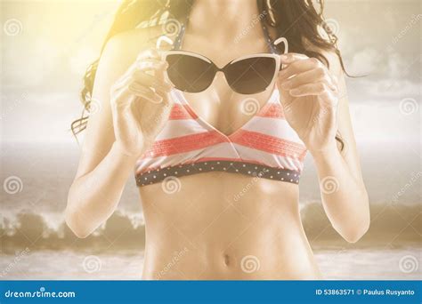 Woman Wearing Bikini And Holds Sunglasses Stock Image Image Of Sand