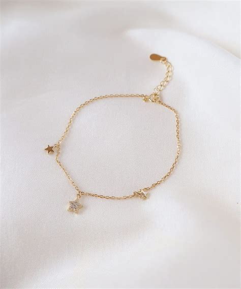 Pulsera estrella cristal dorado Joyería Petunia