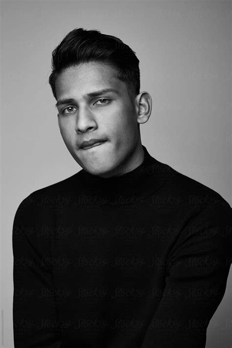 Handsome Indian Guy Portrait Wearing Turtle Neck Isolated On Black And White Del Colaborador