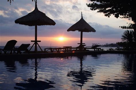 Lombok sunset | Patio umbrella, Outdoor, Patio