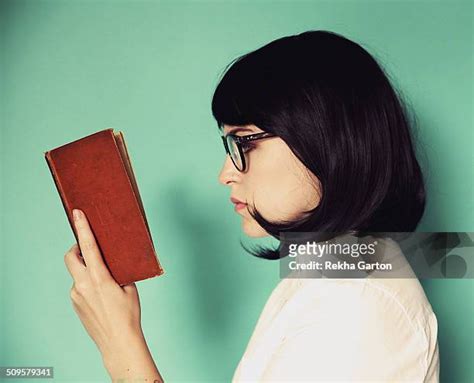 2137 Reading A Book Profile Stock Photos High Res Pictures And