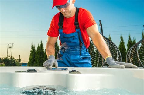 Worker Cleaning Hot Tub In Red Shirt And Blue Overalls Stock Image Image Of Plumbing Adult