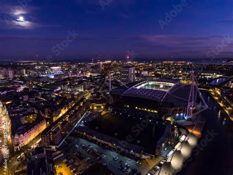 Aerial View Of Cardiff City Centre And The Bay Area At Night Stock