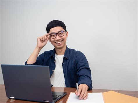 Premium Photo Businessman Wear Glasses Smile Sitting At Working Table