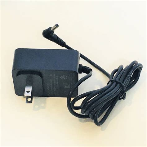 Ac Dc Power Supply Adapter Wall Charger 12v 1500ma Output 30 Mm X 10