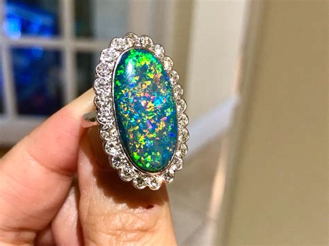 Australian Black Opal And Diamond Cluster 18 Karat Gold Ring For Sale