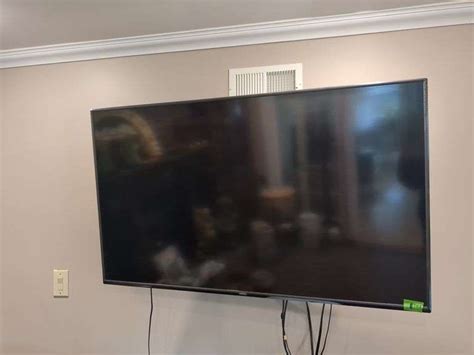 60" Vizio TV, Wall Mount, and Remote - Delaware Auction Center