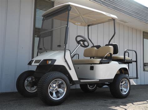 This Custom 2001 E Z GO PDS Precision Drive System Electric Golf Car