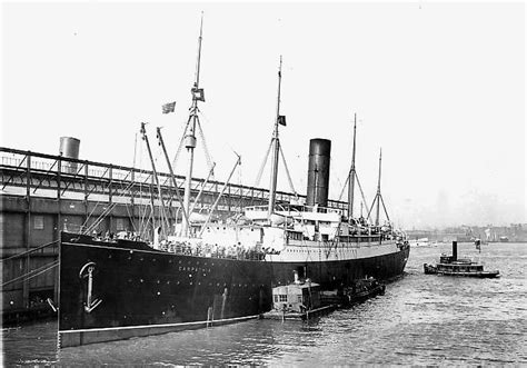 The Rms Carpathia Arriving At Pier With Titanic Survivors Photo Of