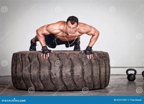 Push Up On A Tire Crossfit Training Stock Image Image Of People