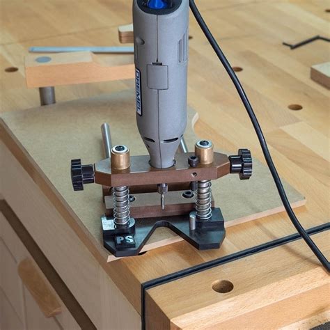 Homemade Dremel Plunge Base Plans