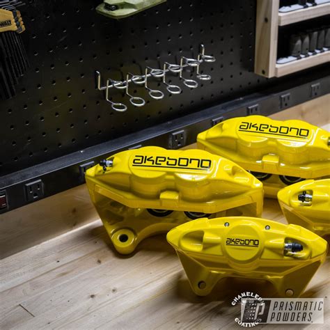 Akebono Brake Calipers done in Yes Yellow | Prismatic Powders