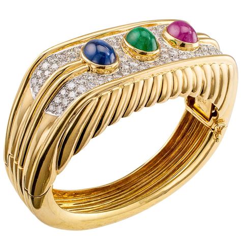 Cartier Sapphire Emerald Ruby Yellow Gold Bangle Bracelet At 1stdibs