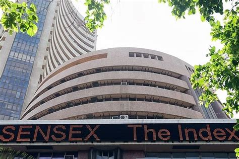 Sensex Rises Above 300 Points Nifty At 12141 Tata Motors Jumps 5