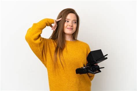 Chica Adolescente Sosteniendo Un Control Remoto De Drone Sobre Fondo