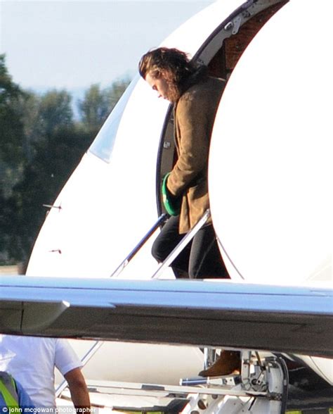 Harry Styles And One Direction Band Mates Arrive At Glasgow Airport In