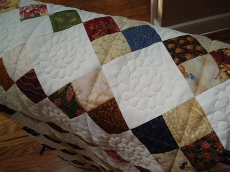 Hand Guided Machine Quilting with a Feathered Wreath