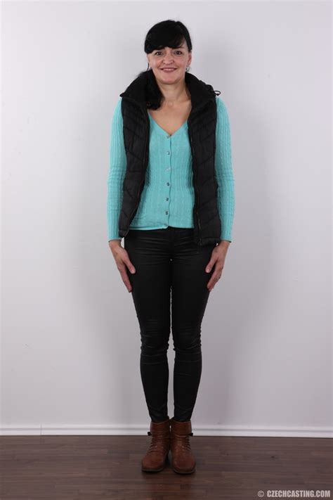 Mature Chick Slowly Peels Off Her Turquoise XXX Dessert Picture 2