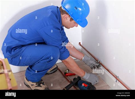 Plumber Fitting Pipes Stock Photo Alamy