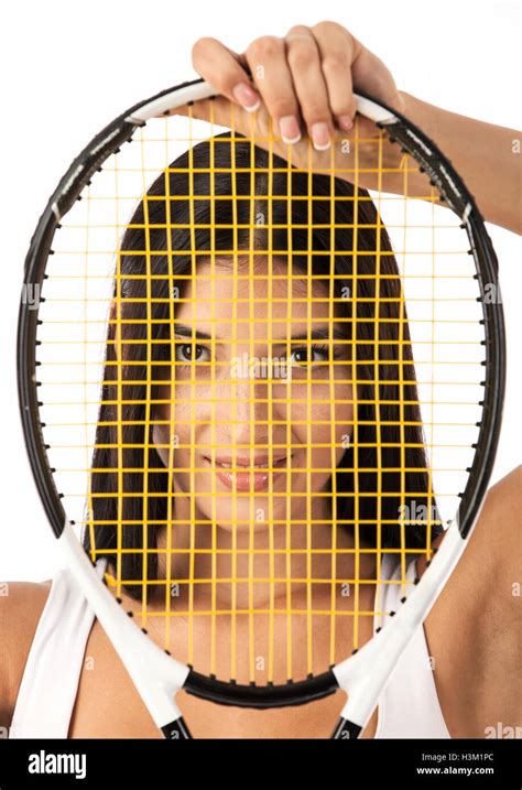 Female Looking Through Strings Of Tennis Racket Stock Photo Alamy