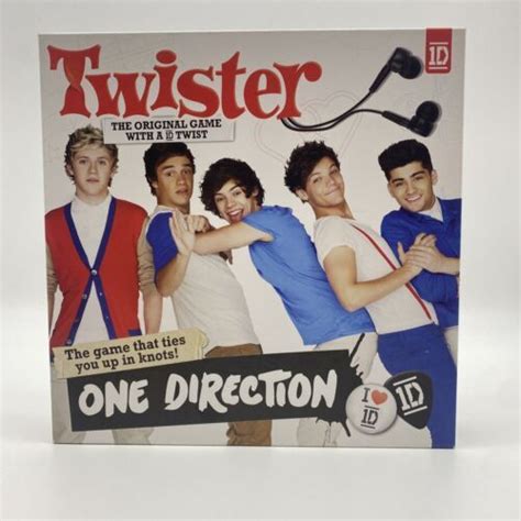 A Magazine Cover With One Direction On It